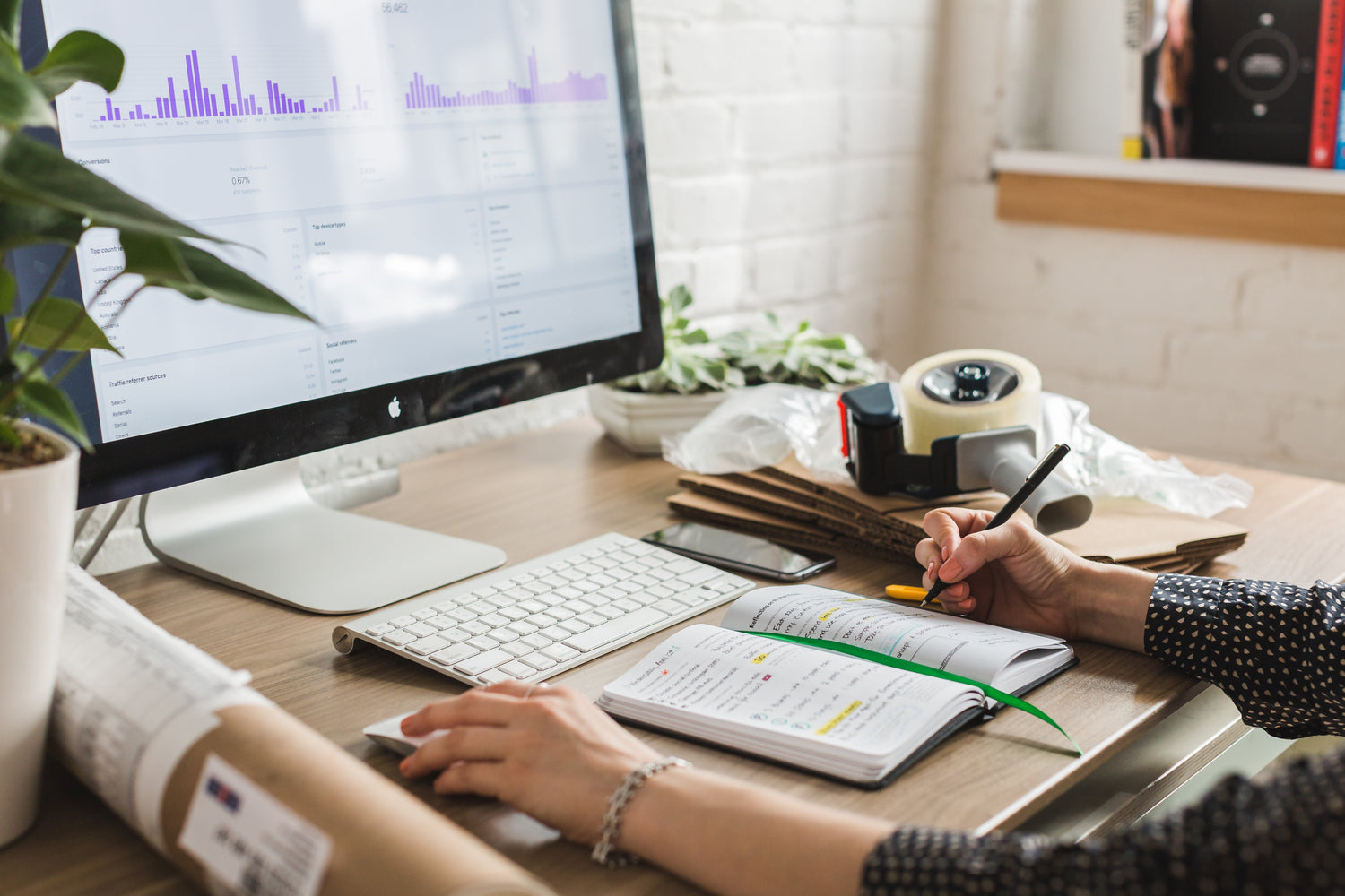 Business owner working at the desk, symbolizing productivity and entrepreneurship